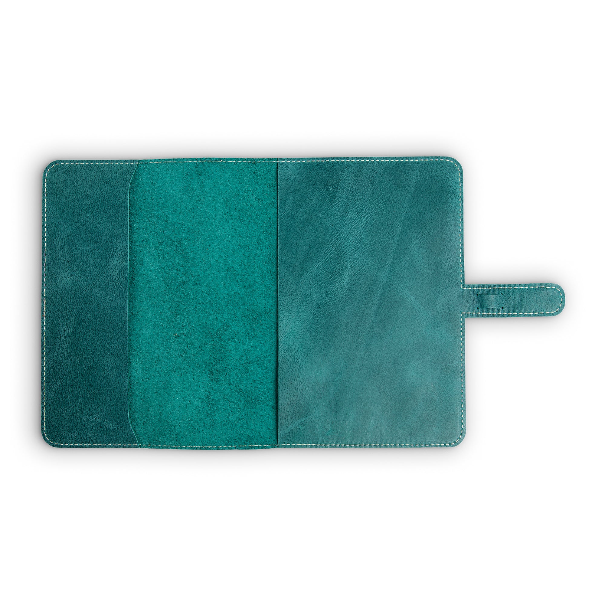 Interior of turquoise green DuPage Laodamas buffalo leather journal fully open and empty, showing pull-up buffalo leather lining and teal suede-like slip pocket insert on left panel.