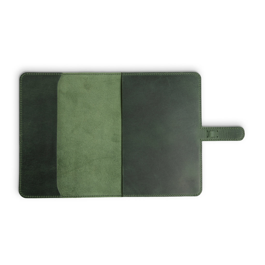 Interior of forest green DuPage leather journal fully open and empty, showing pull-up Dallas Crazy Horse lining on both panels with visible suede-like pocket insert on left side.
