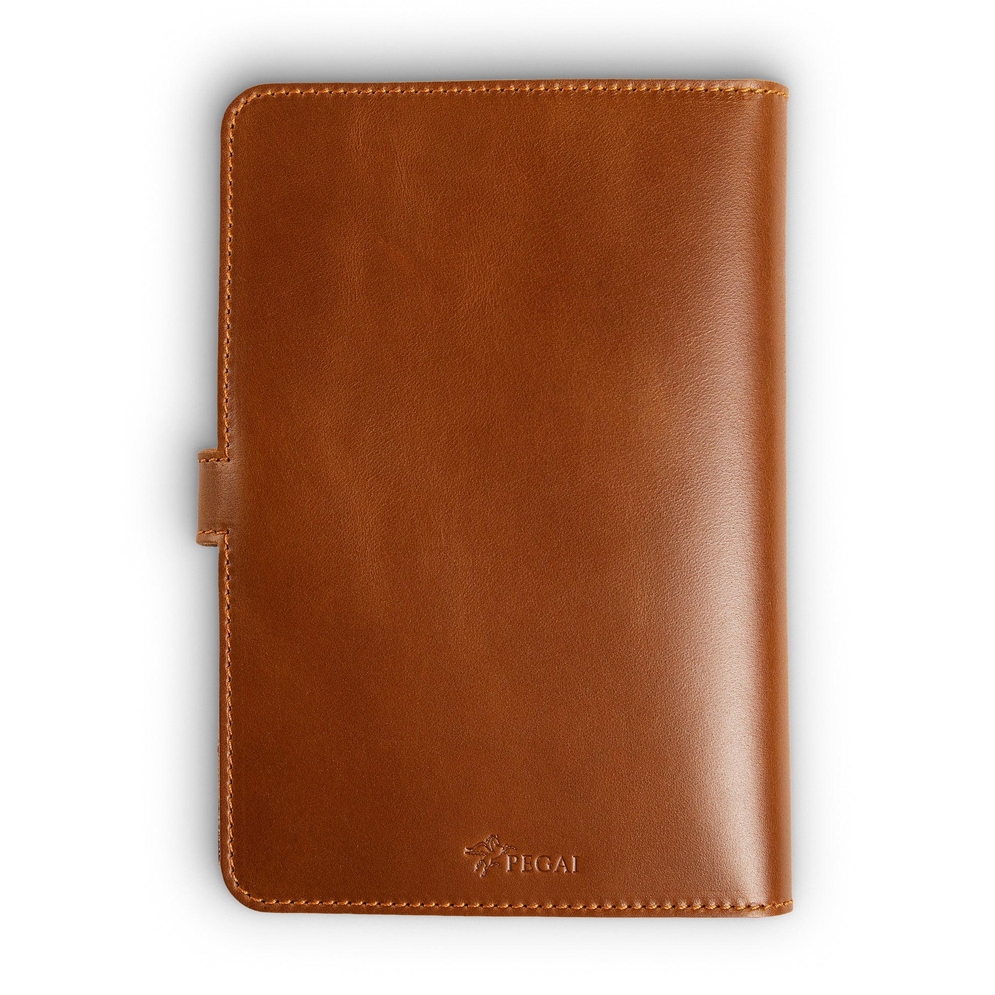 Back cover of mustard brown DuPage Dexios calfskin journal showing warm honey-tan pull-up surface, orange perimeter stitching, side strap tab, and embossed PEGAI logo at bottom center.
