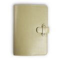 Aqua green Iphitos buffalo leather journal, front cover view, with cream saddle stitching along edges and a leather strap closure secured by two antique brass rivets on the right side.