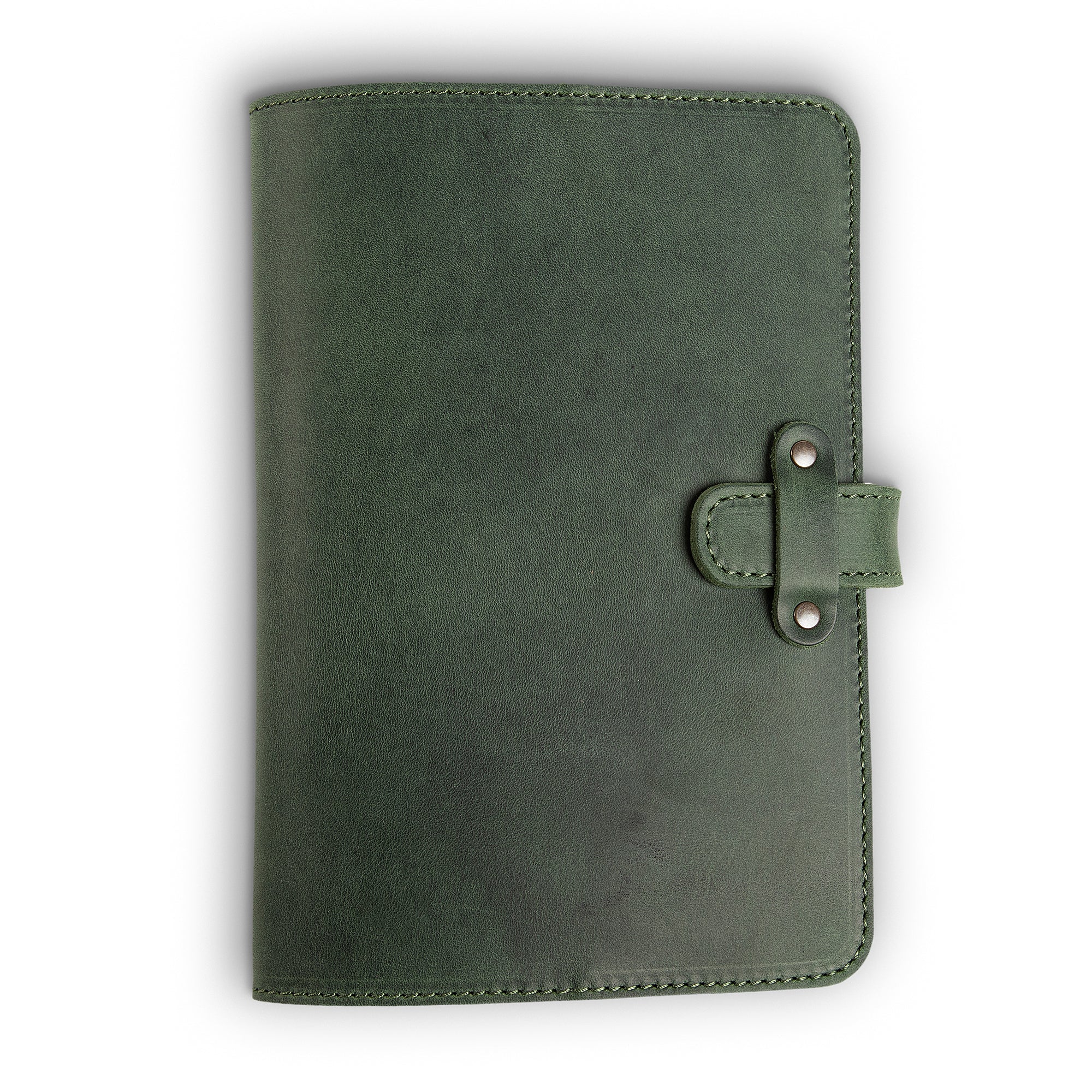 Forest green Dallas Crazy Horse leather journal, front cover view, showing waxy pull-up surface with natural tonal variation, green saddle stitching, and antique brass rivet strap closure on right side.