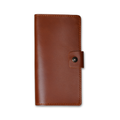 Clark Leather Checkbook Cover in Dual Tone Whiskey, closed on white. DT Lux cowhide in warm whiskey tan with glossy pull-up finish and tonal depth. Warm tonal saddle stitching on all edges. Antique brass snap tab on right.