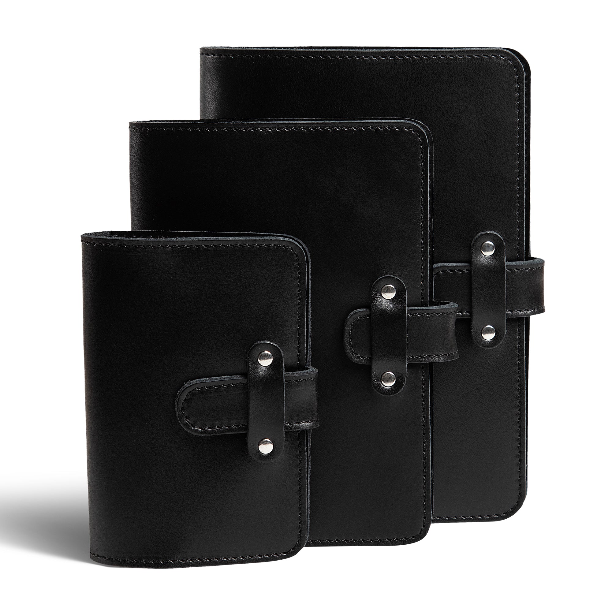Three DuPage leather journals in black displayed together showing Pocket, Midi, and Full size comparison, all with matching black stitching and silver-tone rivet strap closures. 