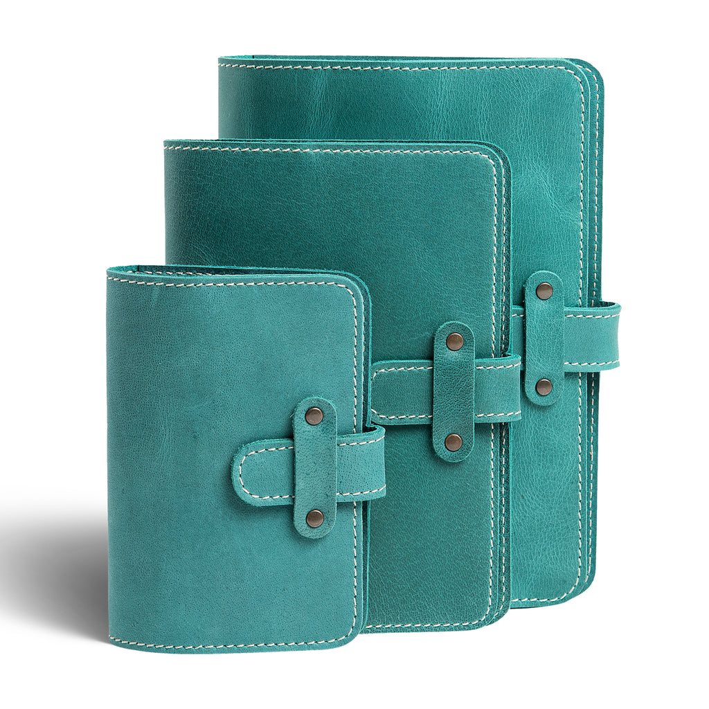 Three DuPage leather journals in turquoise green showing Pocket, Midi, and Full size comparison, all with matching cream saddle stitching, antique brass rivets, and distressed buffalo pull-up surfaces.