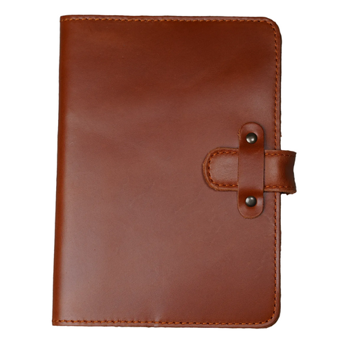Dual Tone Whiskey Brown DT Lux cowhide leather journal, front cover on white background, showing warm amber glossy pull-up surface with tonal shift, orange saddle stitching, and antique brass rivet strap closure. 