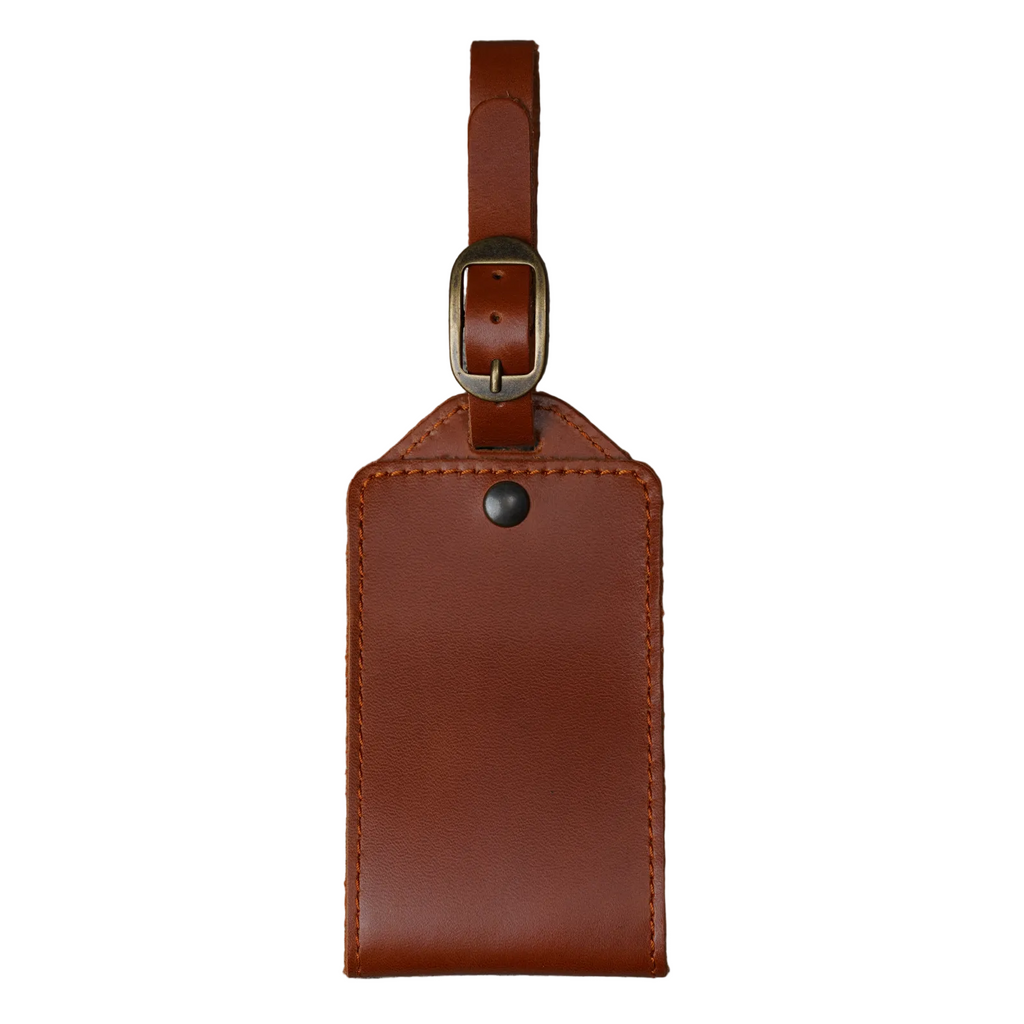 Tan DT Lux leather luggage tag with antique brass buckle and adjustable travel strap