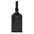 Black Dymnos full-grain leather luggage tag with antique brass buckle and textured pull-up finish