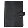 Dymnos Black full-grain calfskin leather journal, front cover on white background, showing pebbled pull-up surface with natural grain texture, black saddle stitching, and antique brass rivet strap closure.