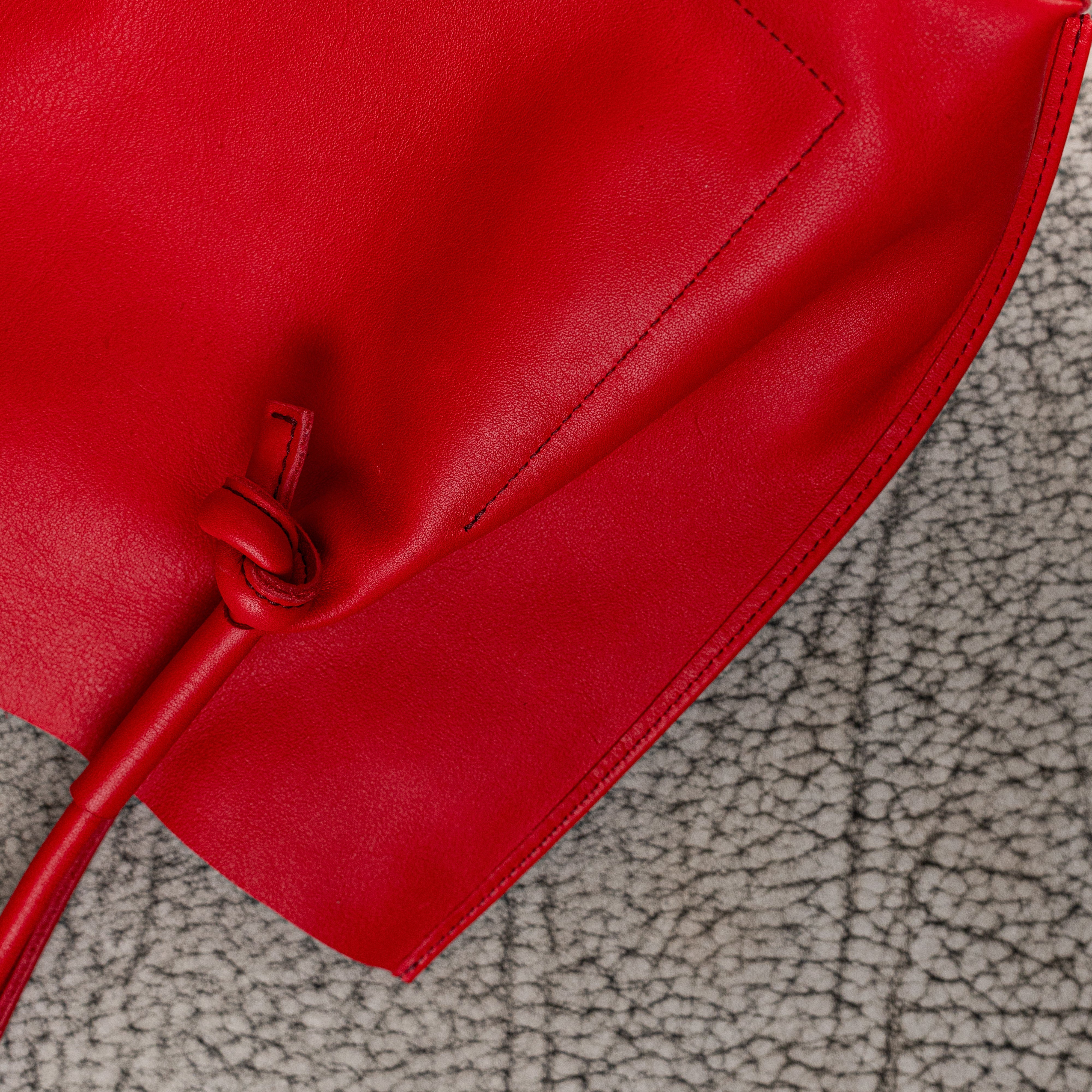 Flora Everyday Leather Tote in Smooth Calf Red with suede interior, rolled handles, and artisan edge details—crafted for bold, everyday elegance.