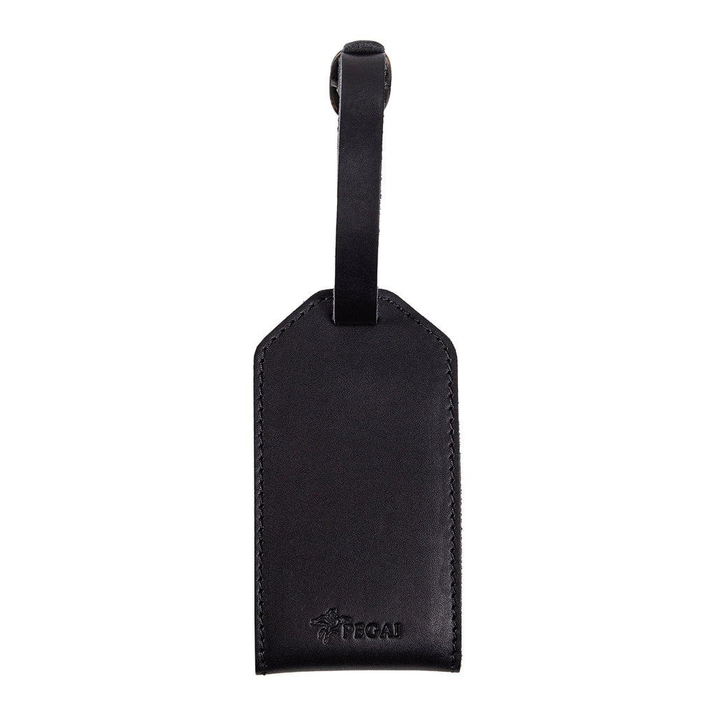 Back view of black leather luggage tag with embossed Pegai logo and adjustable strap