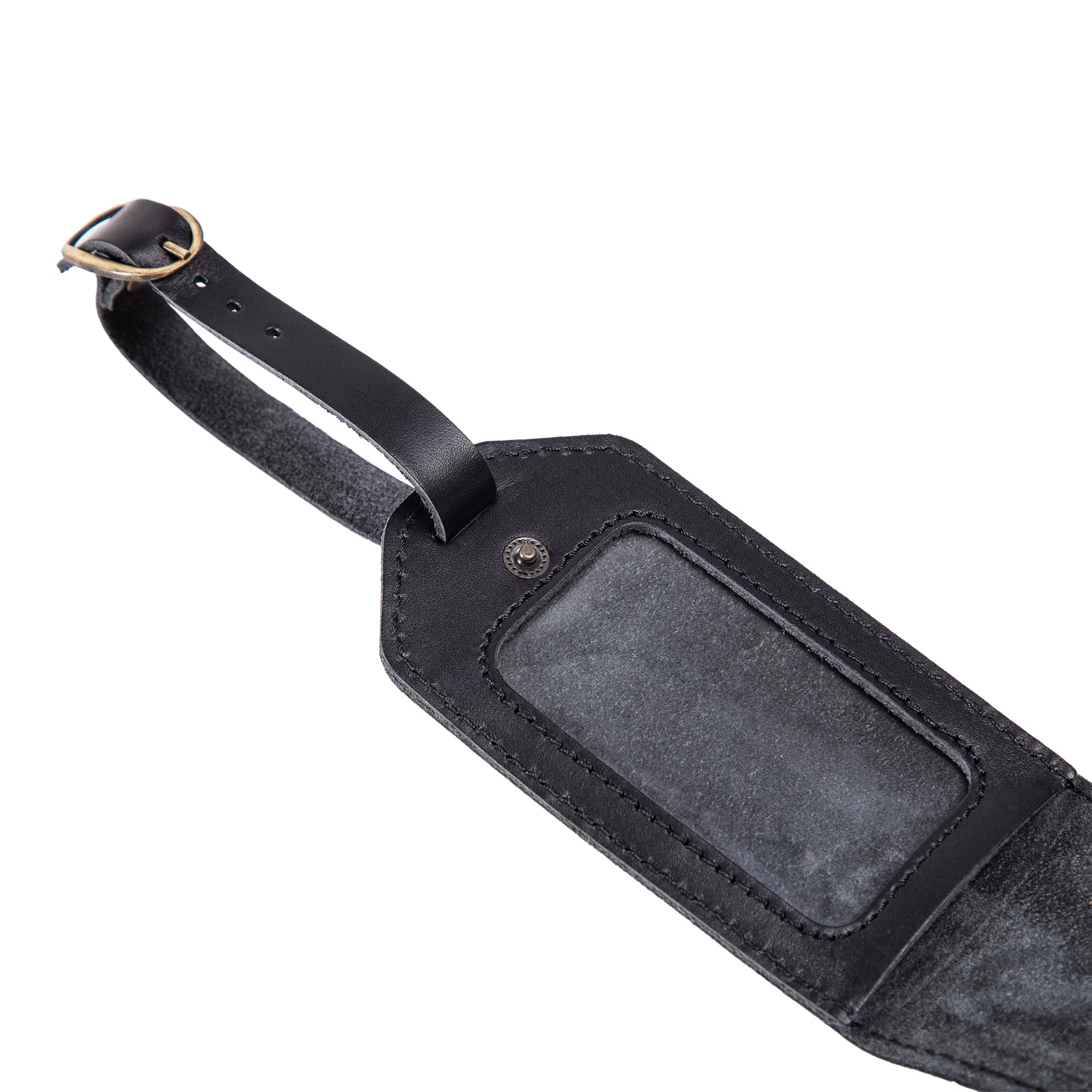 Black leather luggage tag interior with clear identification window and suede backing