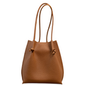 Flora Everyday Leather Tote in Togo Calf Taba, front view on white background. Structured bucket-style tote with tall rolled leather handles and two knotted leather ties cinching the open top.