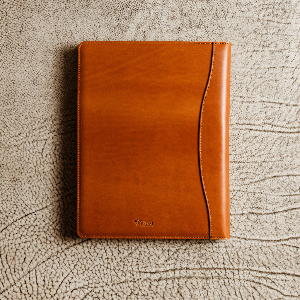 Handcrafted leather padfolio in Whiskey Cognac with pen holder, card pocket, and folder slot—designed by Tanner Leatherstein for legal pads.