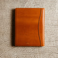 Handcrafted leather padfolio in Whiskey Cognac with pen holder, card pocket, and folder slot—designed by Tanner Leatherstein for legal pads.