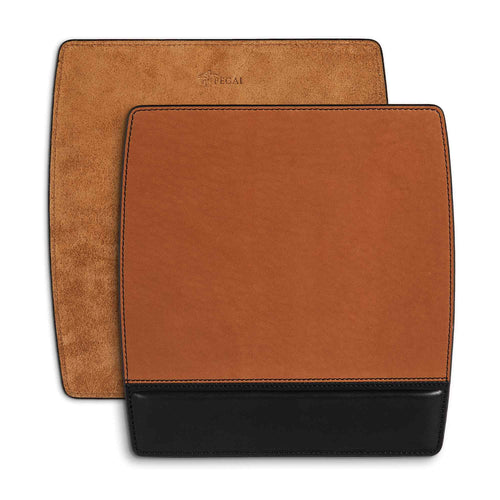 Two Bumpy Leather Mouse Pads in Maui Taba Brown stacked slightly offset on a white surface, showing both sides. Front pad displays the two-tone design: warm taba brown full-grain suede upper tracking surface and a deep black smooth leather wrist rest panel along the bottom, finished with dark contrast saddle stitching. Rear pad shows the warm taba brown suede backing with debossed PEGAI horse logo stamp near the top edge.